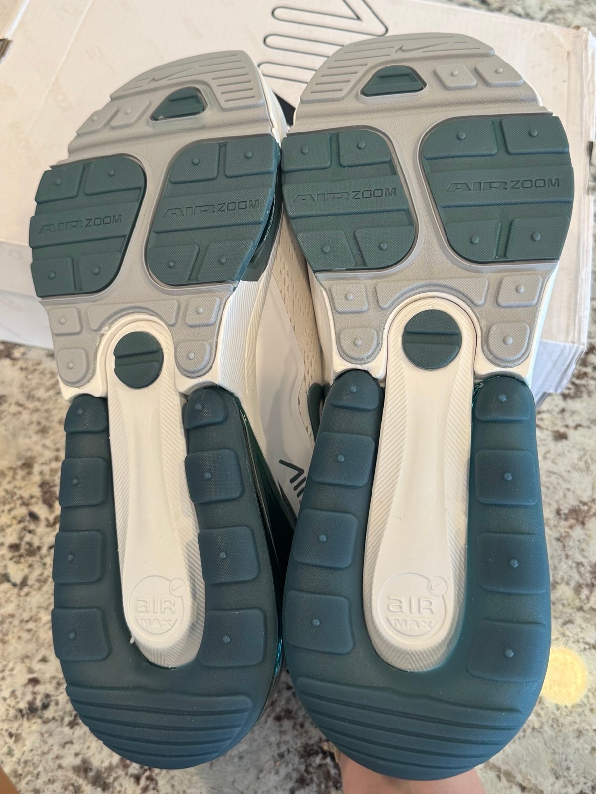 Detail view of Nike Air Max 270 Premium white and green sneaker